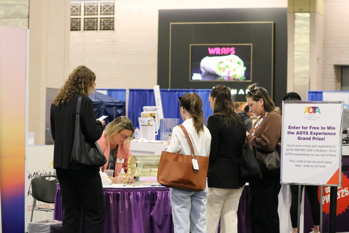 Staff assisting at the AOTA Experience